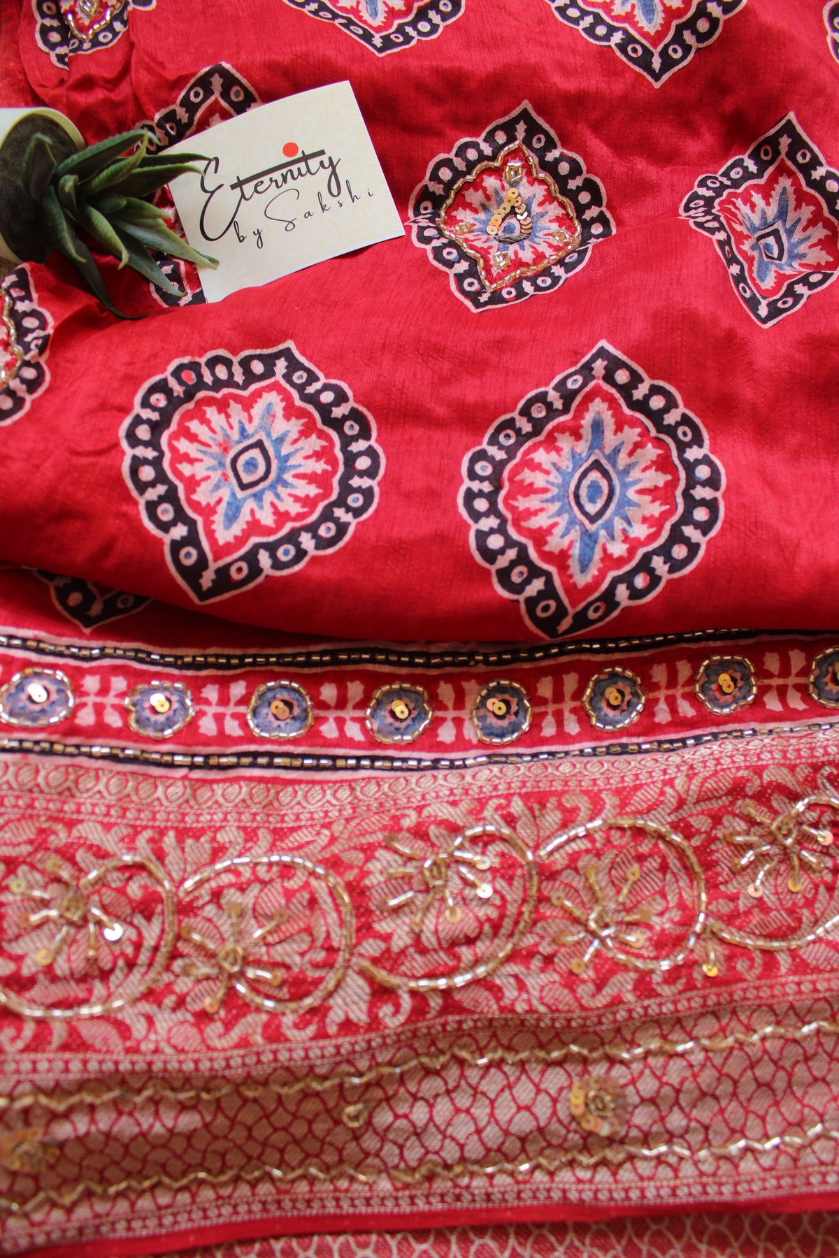 Ruby Maharani Ajrakh Dola Silk Handwork Saree