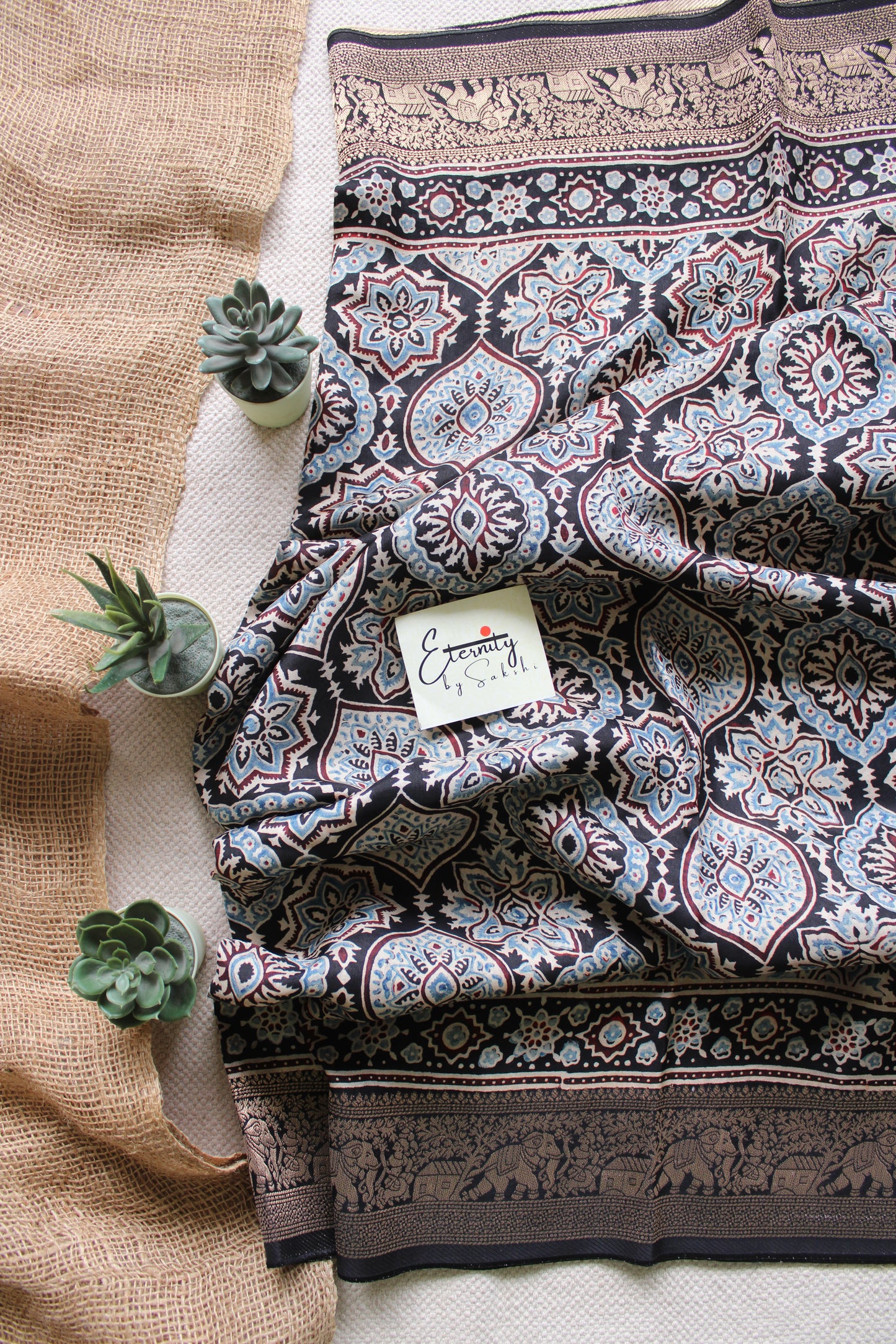 Shyaam Pushp Ajrakh Dola Silk Saree