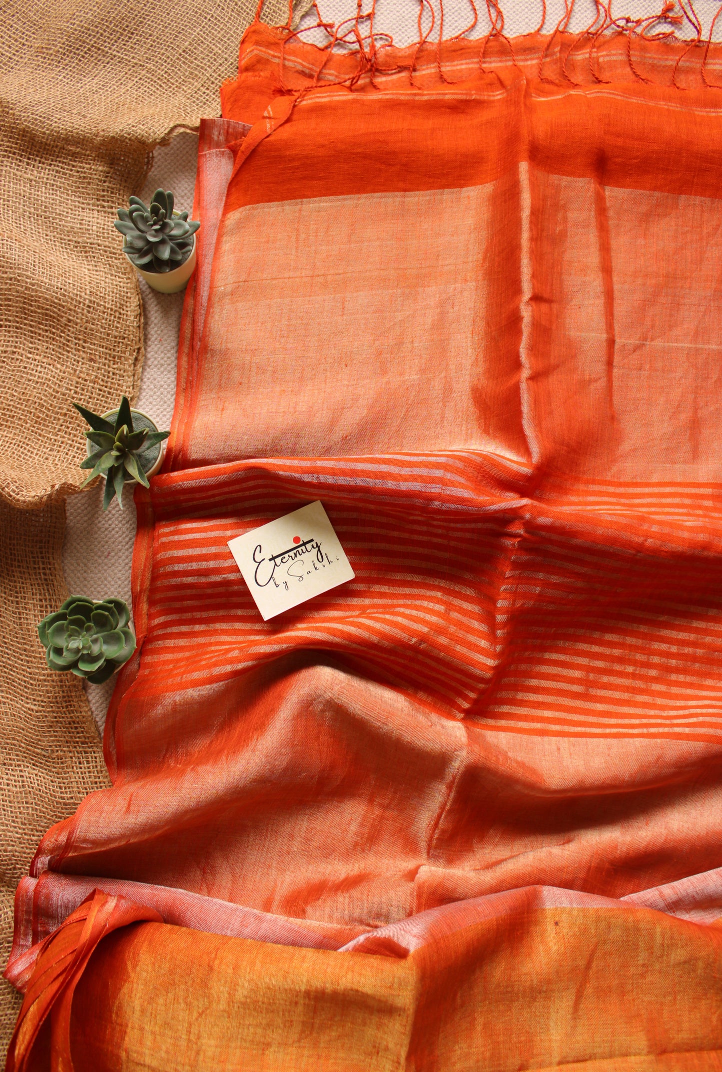 Nayana Metallic Rust Orange Saree