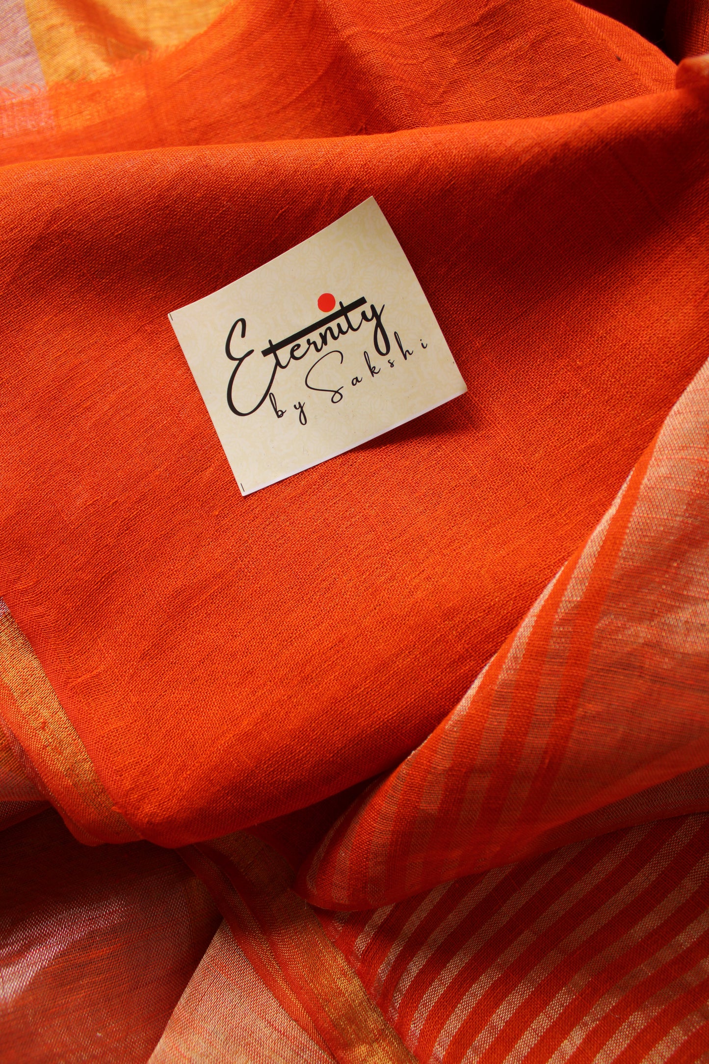 Nayana Metallic Rust Orange Saree