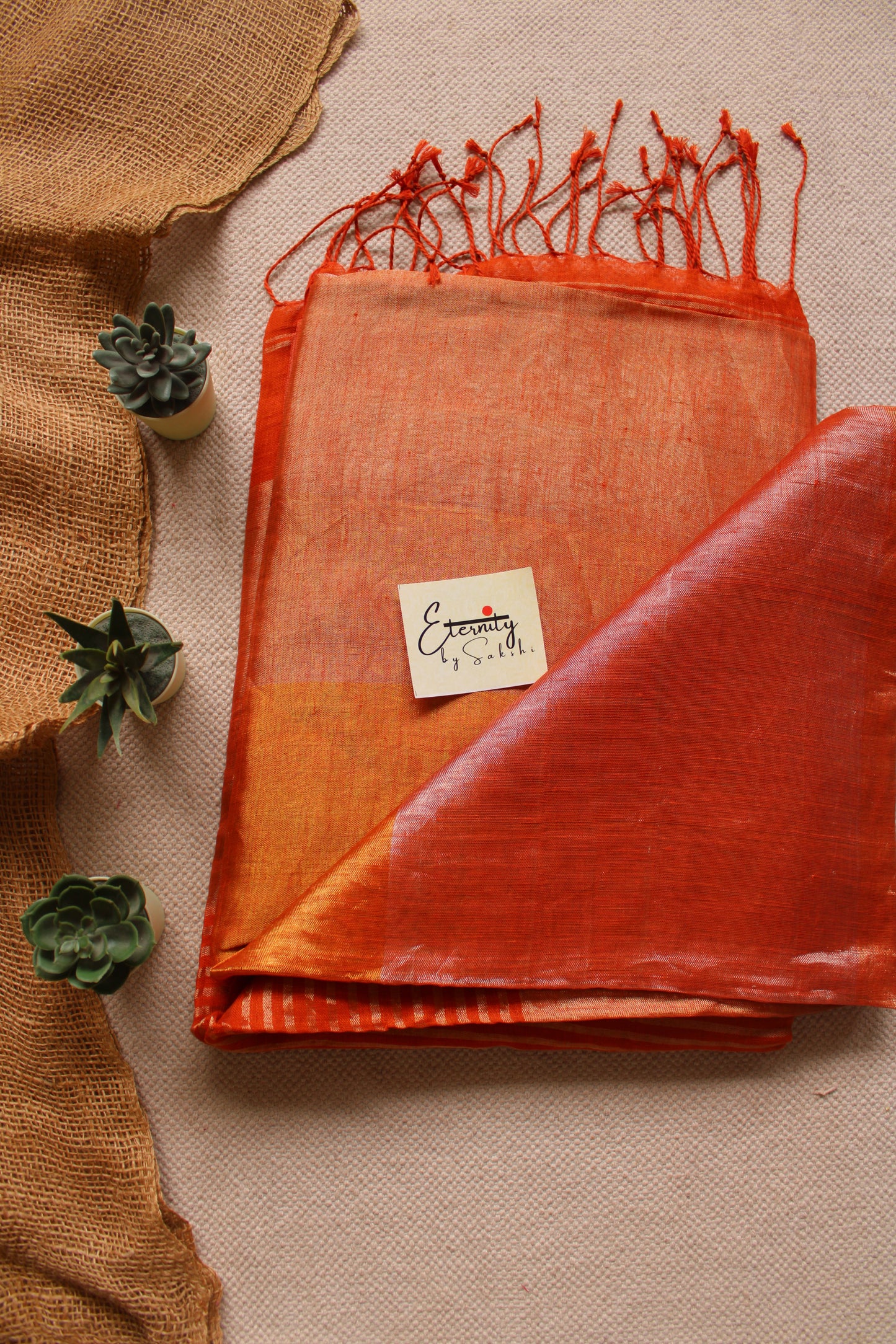 Nayana Metallic Rust Orange Saree